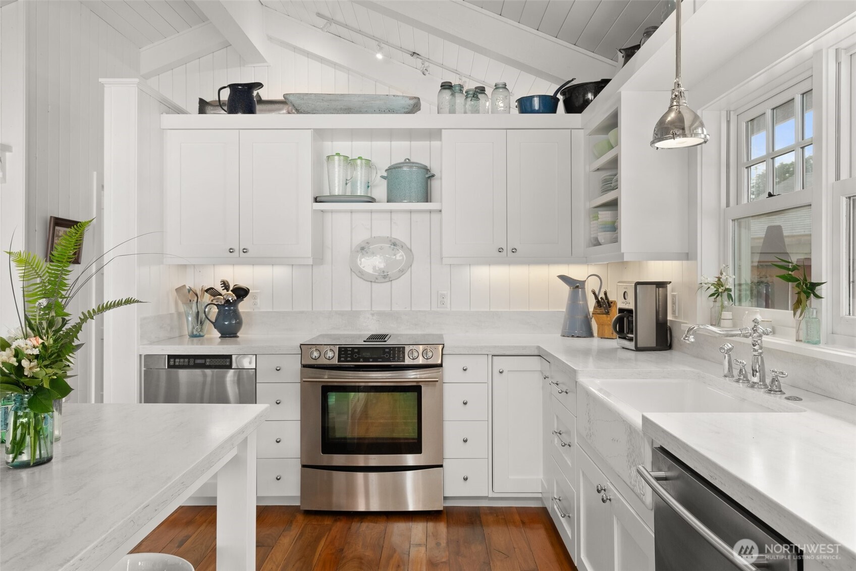 412 Streeter Road Silverlake, WA 98645 - Photo 17 of 40 a kitchen with stainless steel appliances granite countertop a stove and cabinets
