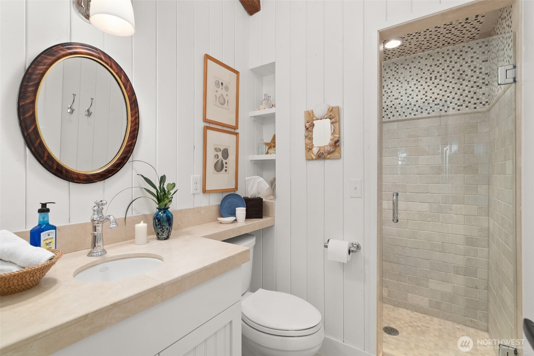 412 Streeter Road Silverlake, WA 98645 - Photo 26 of 40 a bathroom with a granite countertop toilet a sink a mirror a vanity and shower