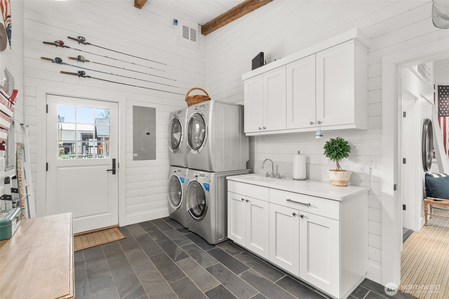 412 Streeter Road Silverlake, WA 98645 - Photo 34 of 40 a utility room with cabinets washer and dryer