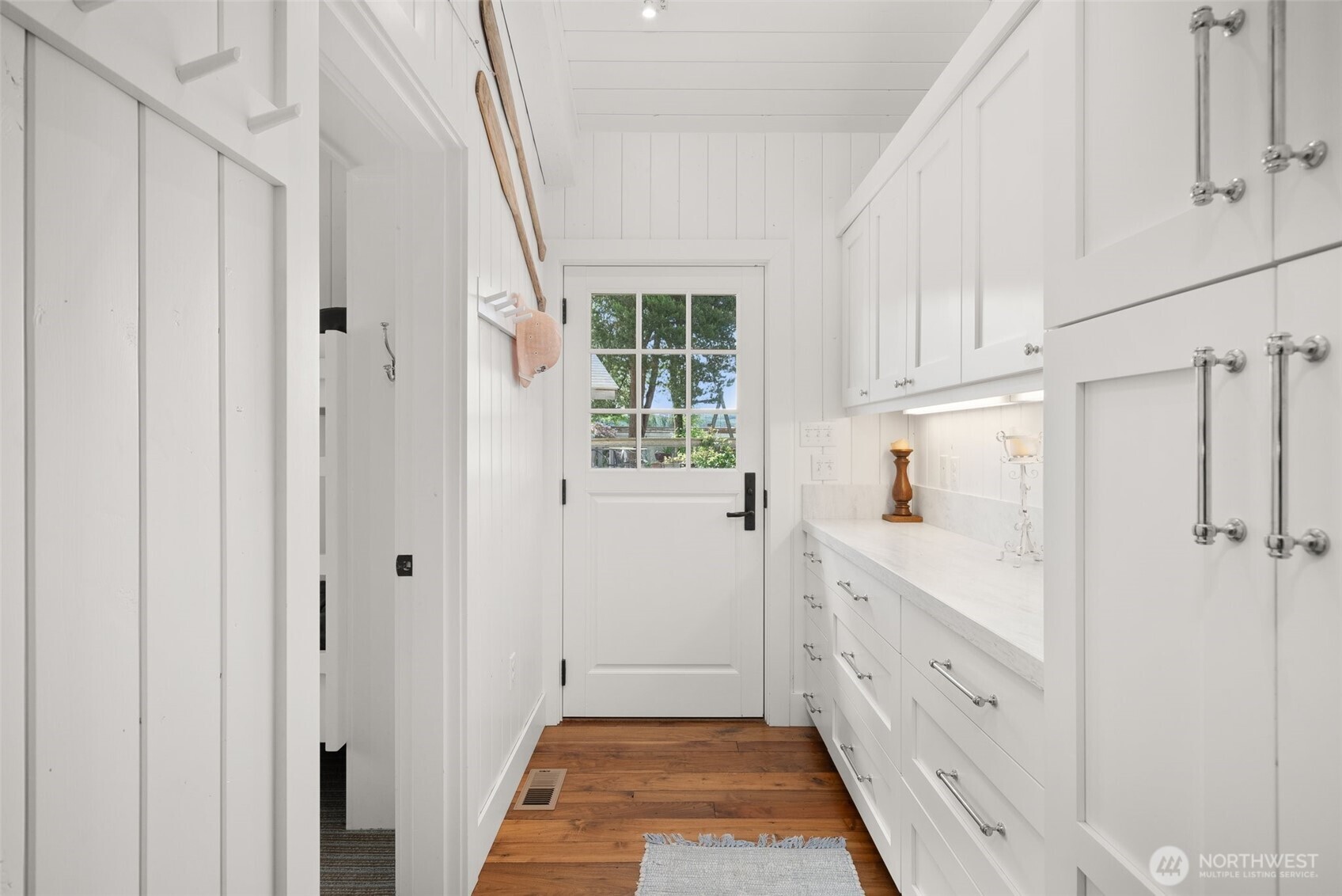 412 Streeter Road Silverlake, WA 98645 - Photo 35 of 40 a kitchen with white cabinets and window