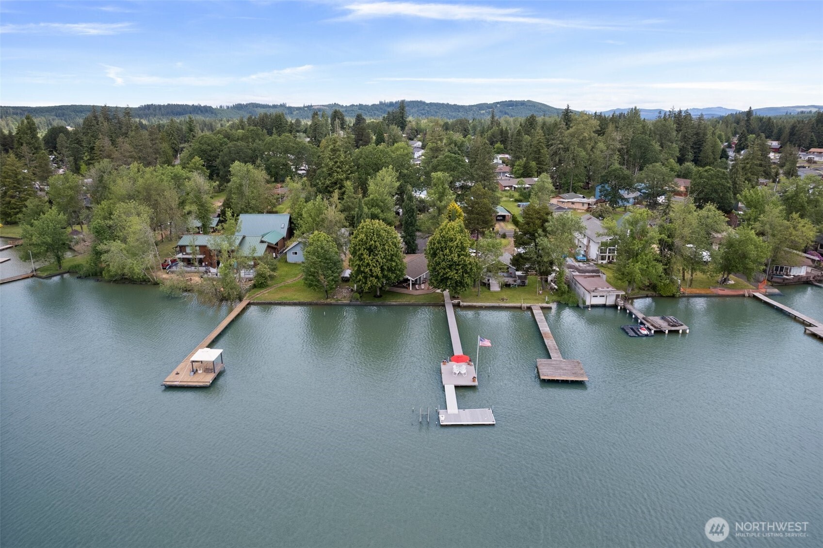 412 Streeter Road Silverlake, WA 98645 - Photo 39 of 40 an aerial view of a house with a yard and lake view