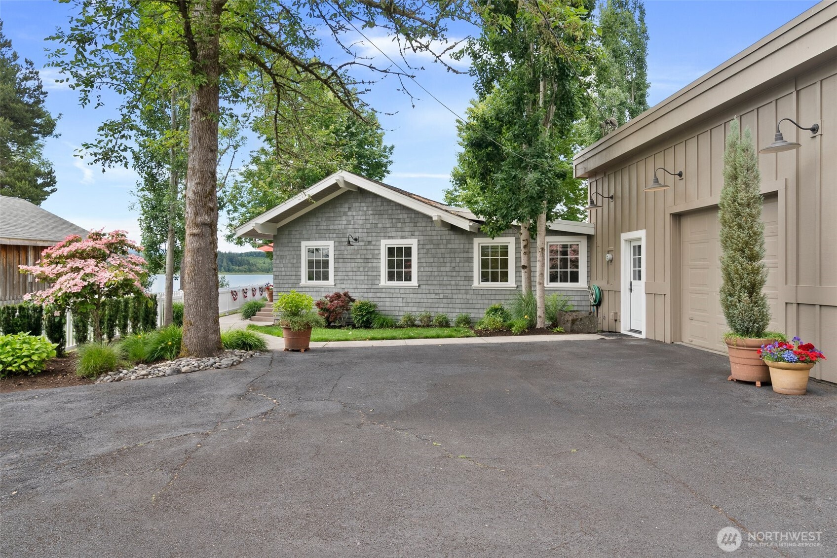 412 Streeter Road Silverlake, WA 98645 - Photo 5 of 40 a view of a house with backyard and garden