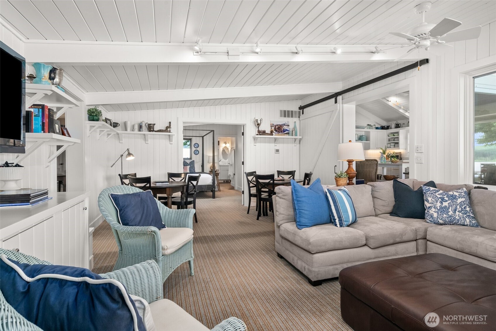 412 Streeter Road Silverlake, WA 98645 - Photo 9 of 40 a living room with furniture and a fireplace