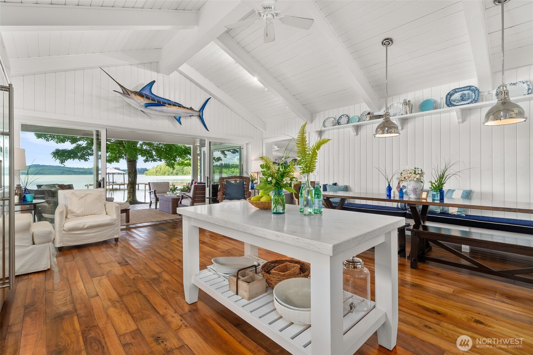 412 Streeter Road Silverlake, WA 98645 - Photo 10 of 40 a view of a dining room with furniture window and wooden floor