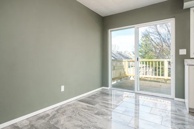 a view of a room with a large window