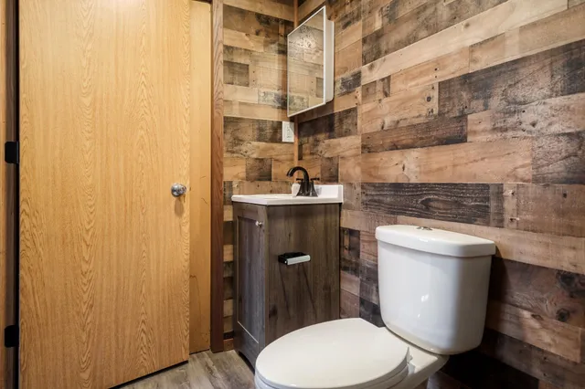 a bathroom with a toilet and a sink