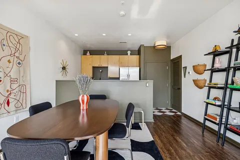 a workspace with furniture and window