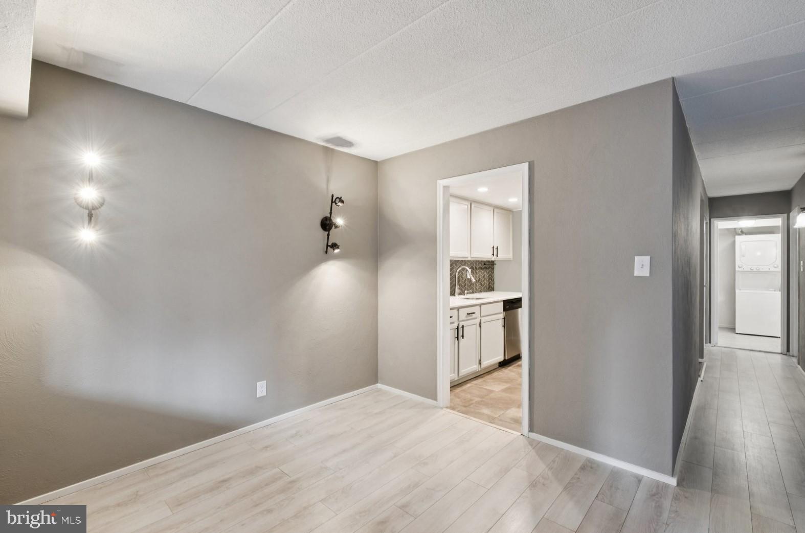 520 North Lemon Street, Unit E8 Media, PA 19063 - Photo 4 of 17 a view of a kitchen with wooden floor and a kitchen