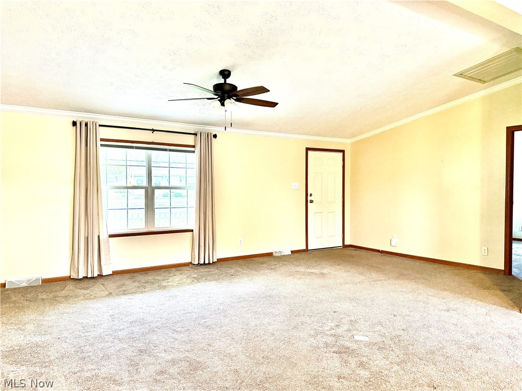5665 Innkeeper Street Southeast Dennison, OH 44621 - Photo 6 of 13 Open Concept Living with Abundant Sunshine