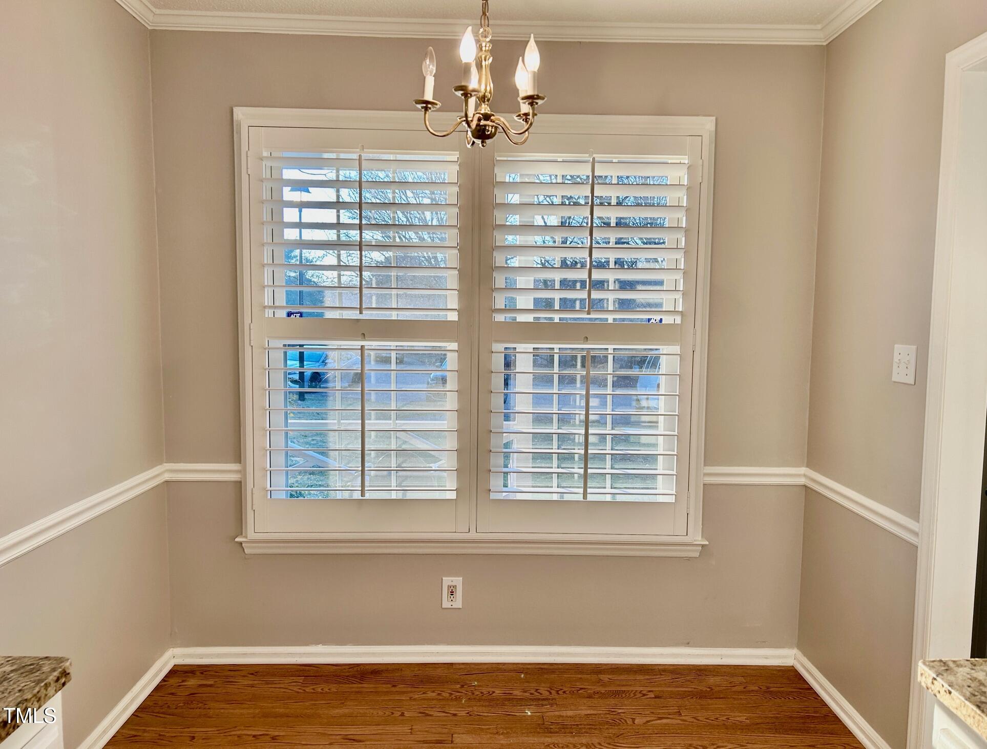 7341 Sweet Bay Lane Raleigh, NC 27615 - Photo 10 of 28 Breakfast room, plantation shutters and hardwood floors