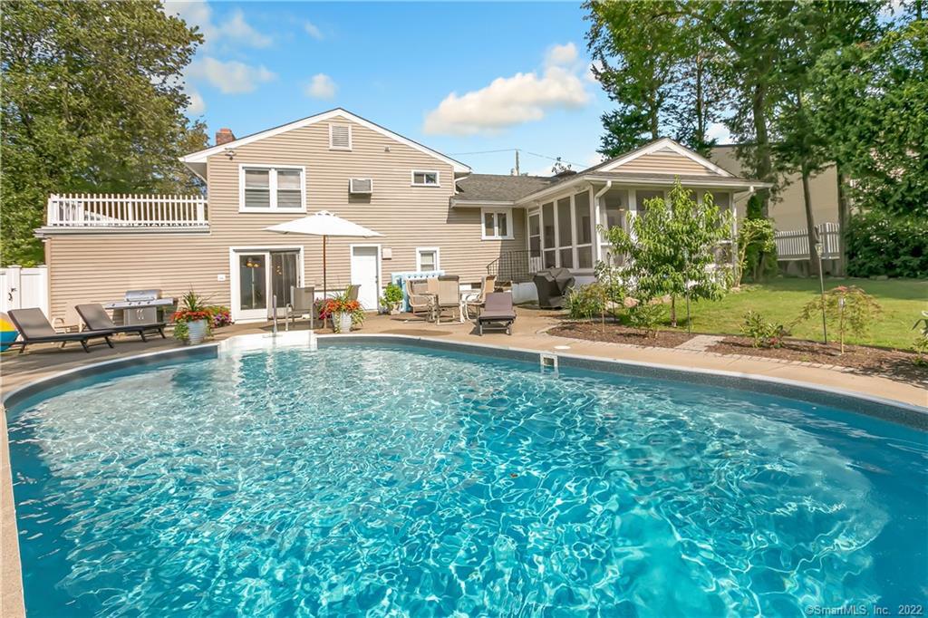 219 Pansy Road Fairfield, CT 06824 - Photo 1 of 1 a front view of a house with garden