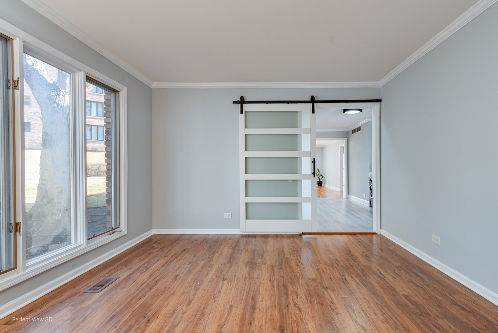 3811 Mission Hills Road Northbrook, IL 60062 - Photo 11 of 26 a view of empty room with wooden floor and fan