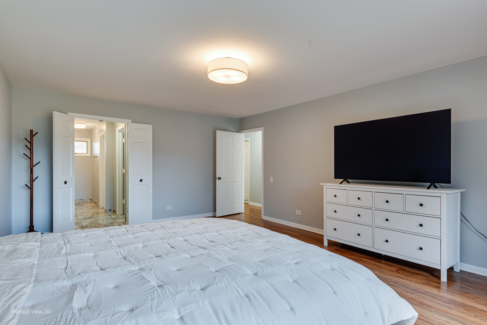 3811 Mission Hills Road Northbrook, IL 60062 - Photo 12 of 26 a bedroom with furniture and flat screen tv