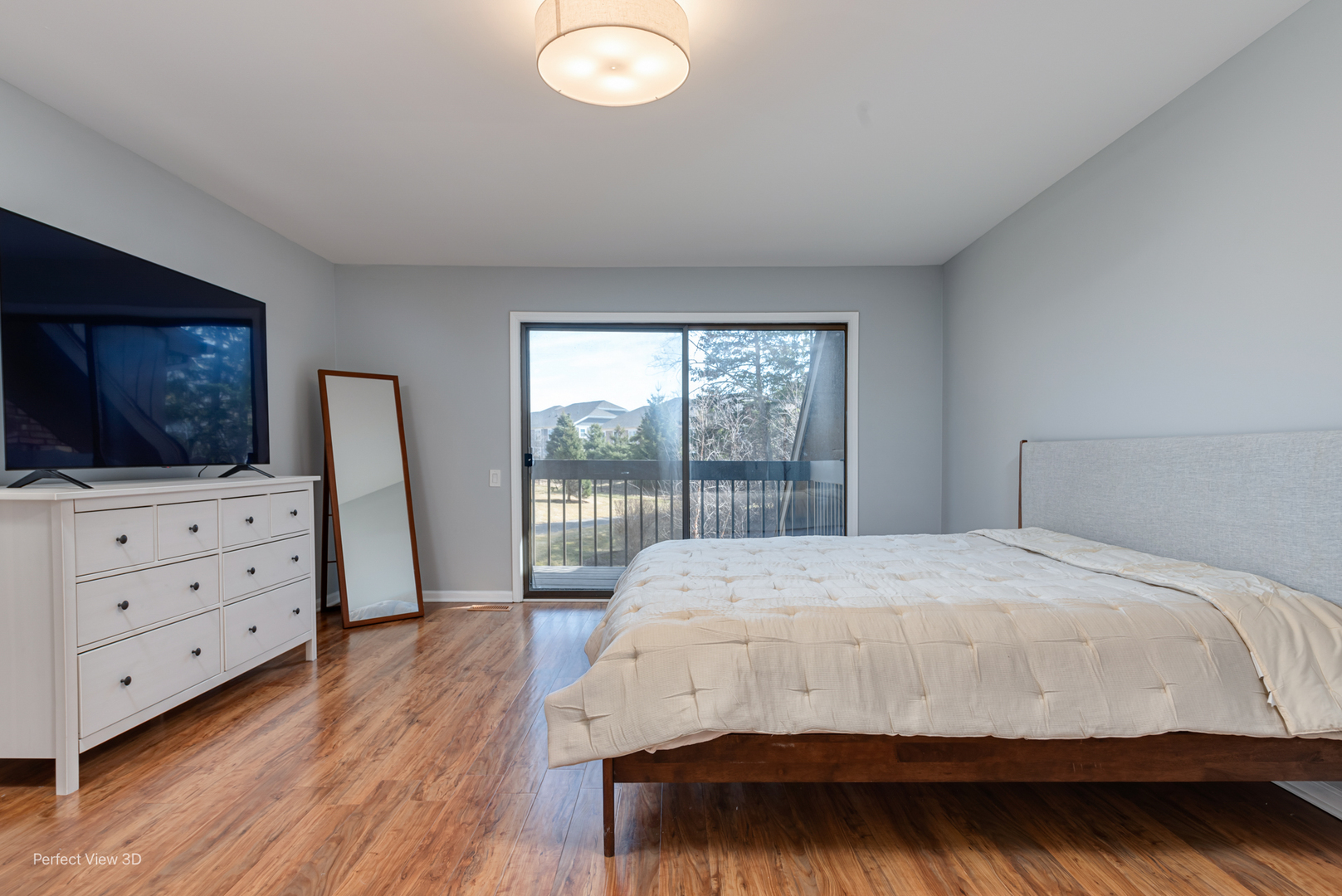 3811 Mission Hills Road Northbrook, IL 60062 - Photo 13 of 26 a bedroom with a bed and flat screen tv