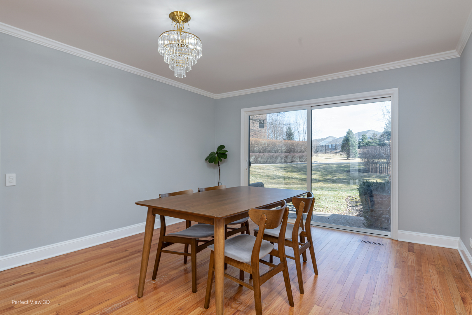 3811 Mission Hills Road Northbrook, IL 60062 - Photo 10 of 26 a view of a dining room with furniture window and wooden floor