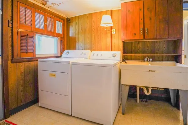 a bathroom with a toilet and a sink