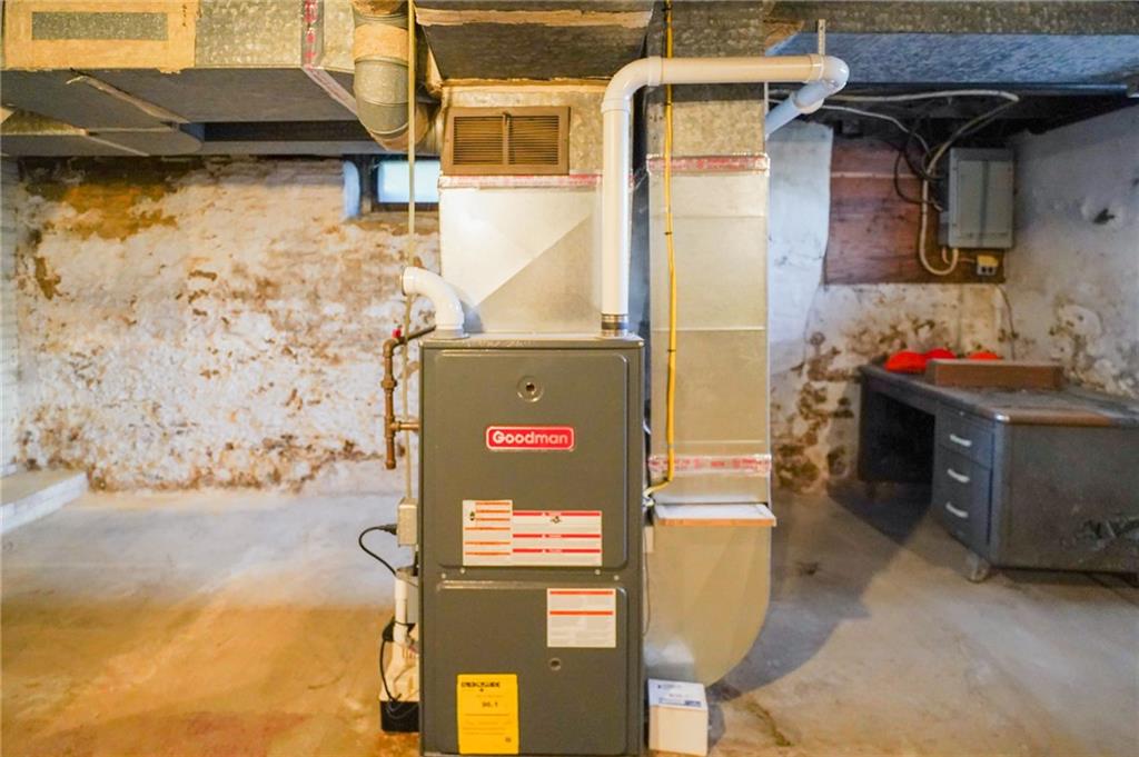 6304 Tuscarawas Road Midland, PA 15059 - Photo 33 of 49 a front view of a house with parking area