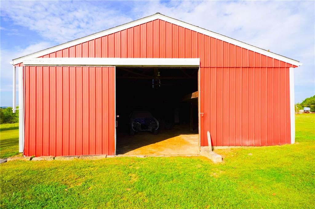 6304 Tuscarawas Road Midland, PA 15059 - Photo 35 of 49 an outdoor view of house with backyard
