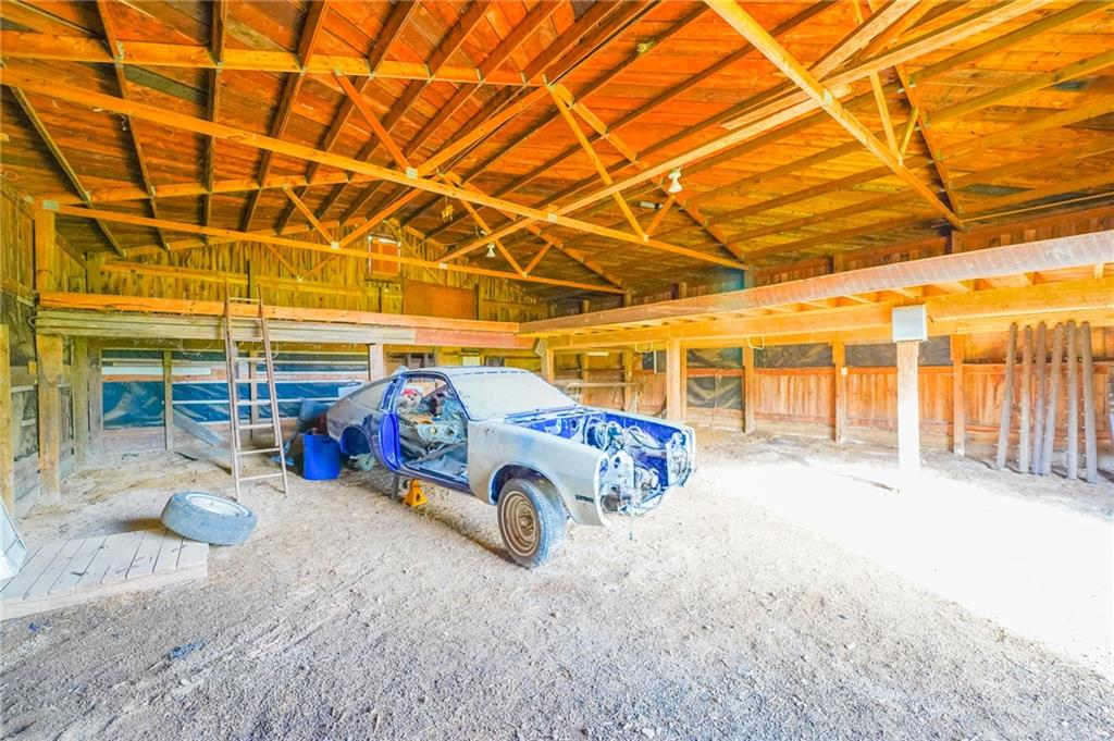 6304 Tuscarawas Road Midland, PA 15059 - Photo 36 of 49 a view of parking garage with cars
