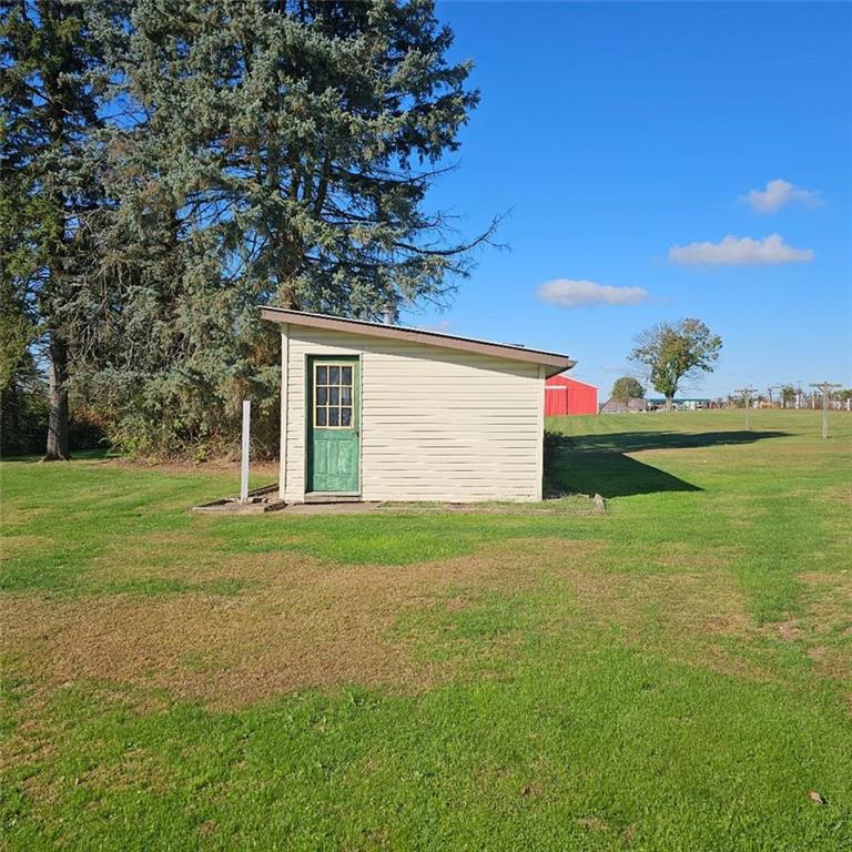6304 Tuscarawas Road Midland, PA 15059 - Photo 45 of 49 a front view of a house with garden