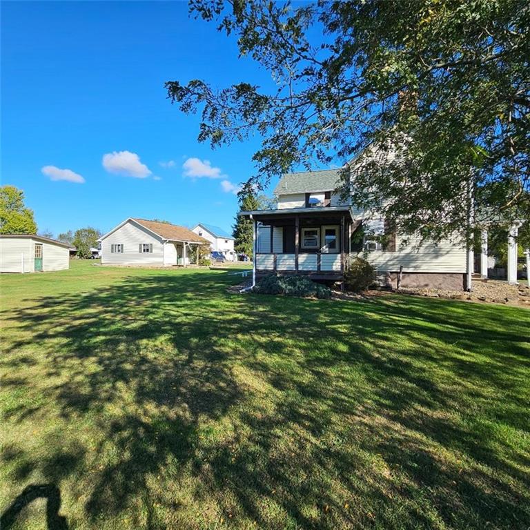 6304 Tuscarawas Road Midland, PA 15059 - Photo 47 of 49 a view of a house with a big yard