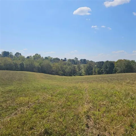 a view of an ocean and a mountain
