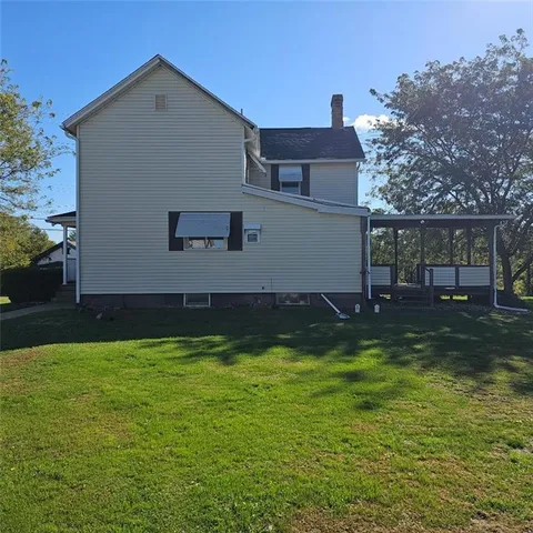 a view of a house with a swimming pool