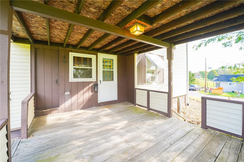 6304 Tuscarawas Road Midland, PA 15059 - Photo 9 of 49 a view of an empty room with a window