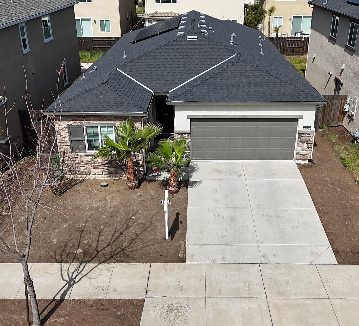 a house view with a outdoor space