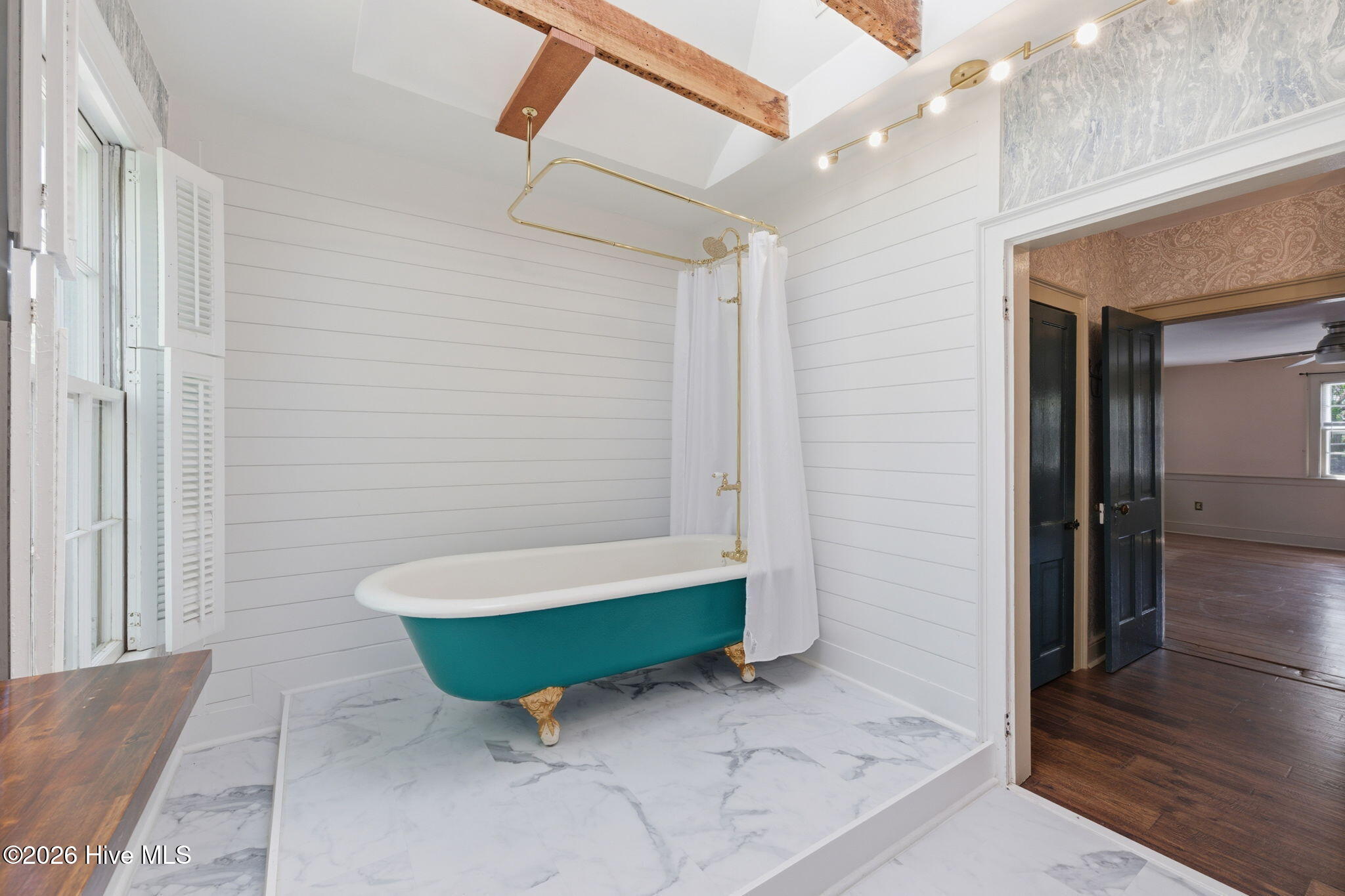 804 Pollock Street New Bern, NC 28562 - Photo 29 of 47 Original tub beautiful placed under a sky light.