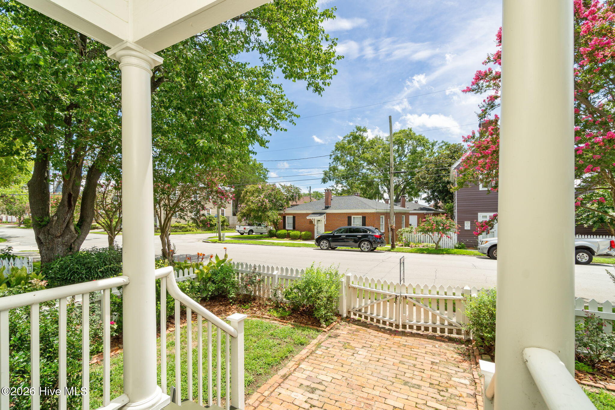 804 Pollock Street New Bern, NC 28562 - Photo 4 of 13 Sits back off Pollock Street surrounded by a white picket fence.