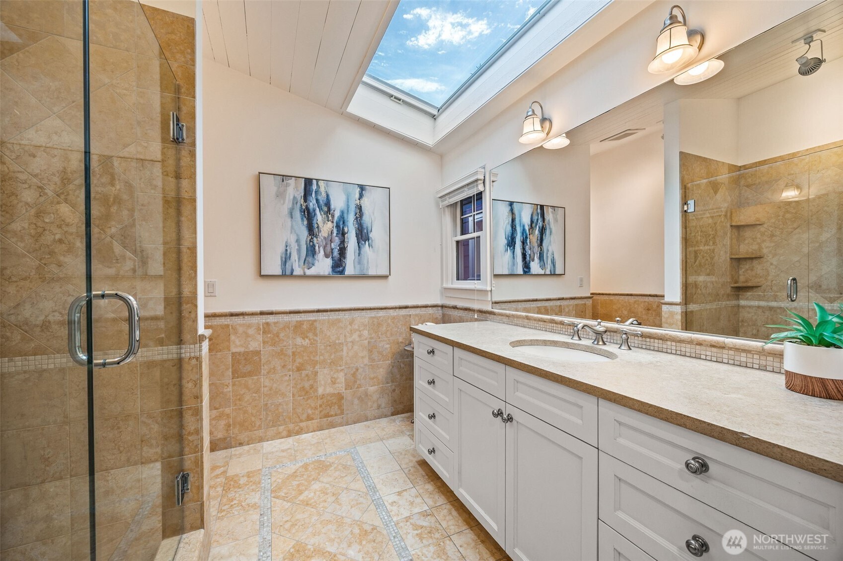 8246 East Mercer Way Mercer Island, WA 98040 - Photo 16 of 39 a spacious bathroom with a granite countertop sink mirror and double