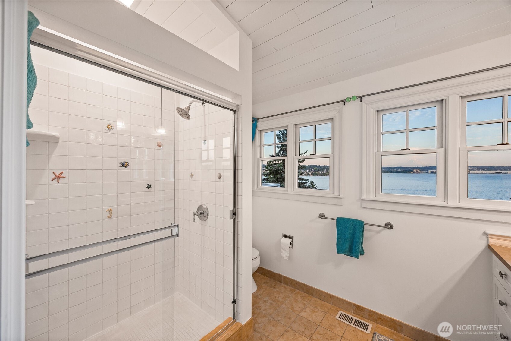 8246 East Mercer Way Mercer Island, WA 98040 - Photo 18 of 39 a bathroom with a shower