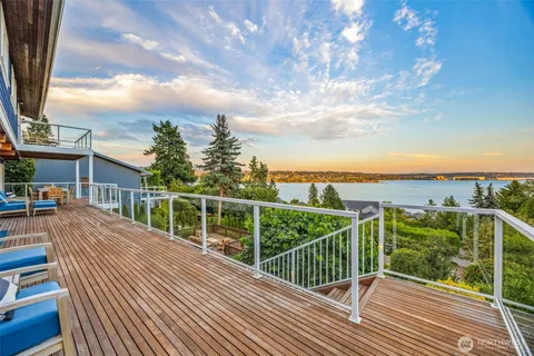 a view of a balcony with city view