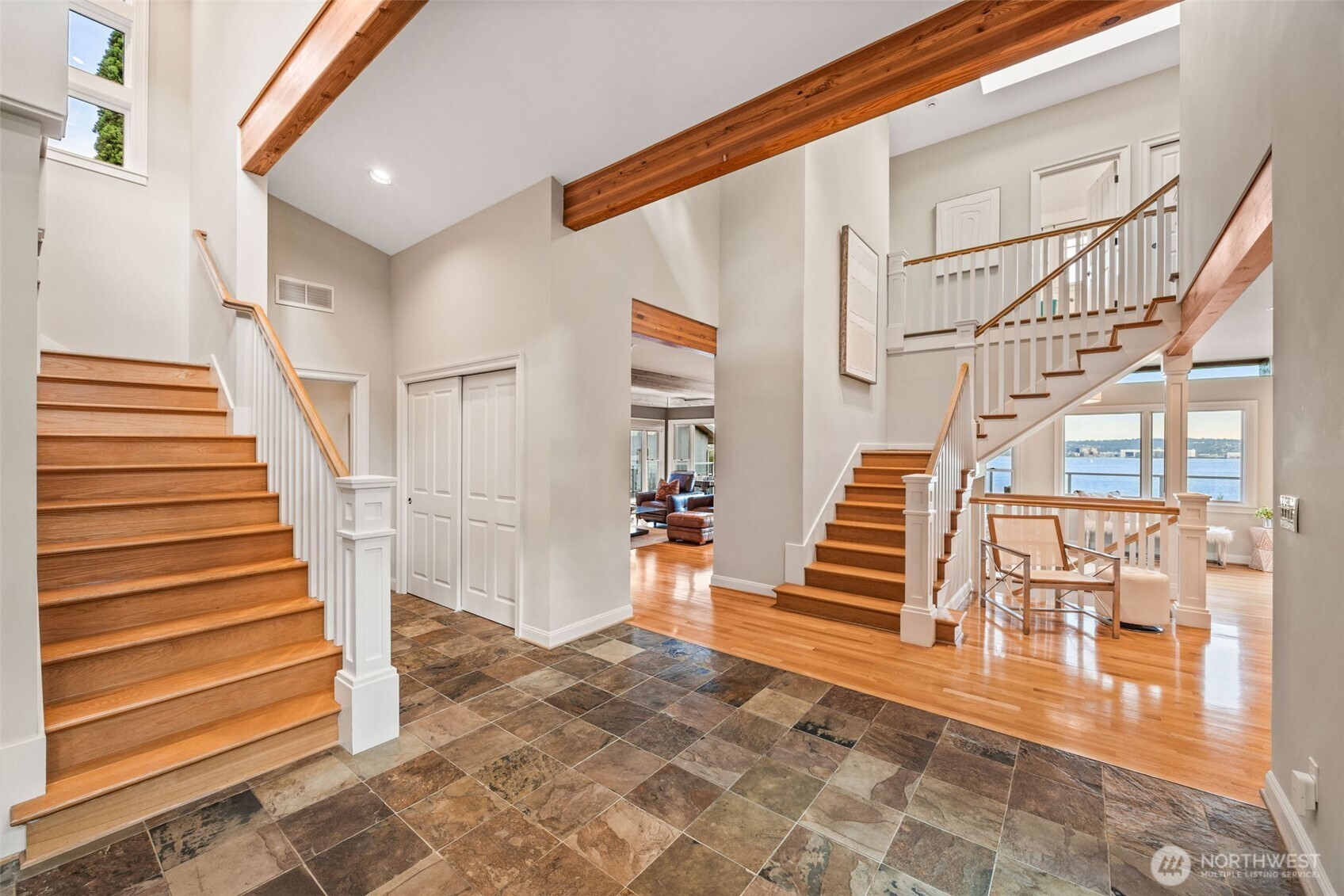 8246 East Mercer Way Mercer Island, WA 98040 - Photo 5 of 39 a view of entryway and hall with wooden floor