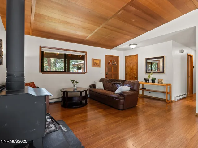 a kitchen with stainless steel appliances granite countertop a sink and a stove