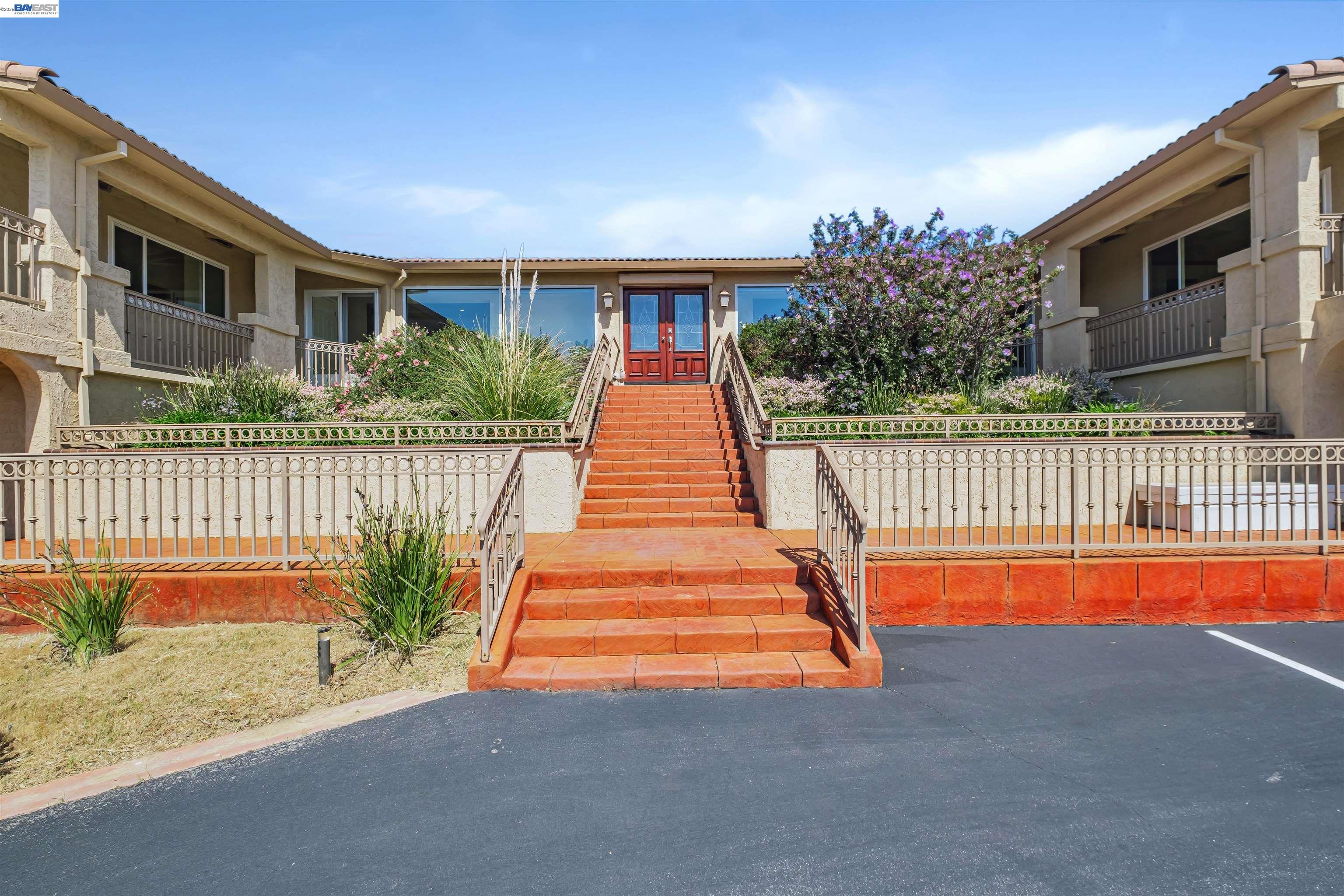 41794 Vargas Road Fremont, CA 94539 - Photo 14 of 60 a view of a house in front of a house with a small yard