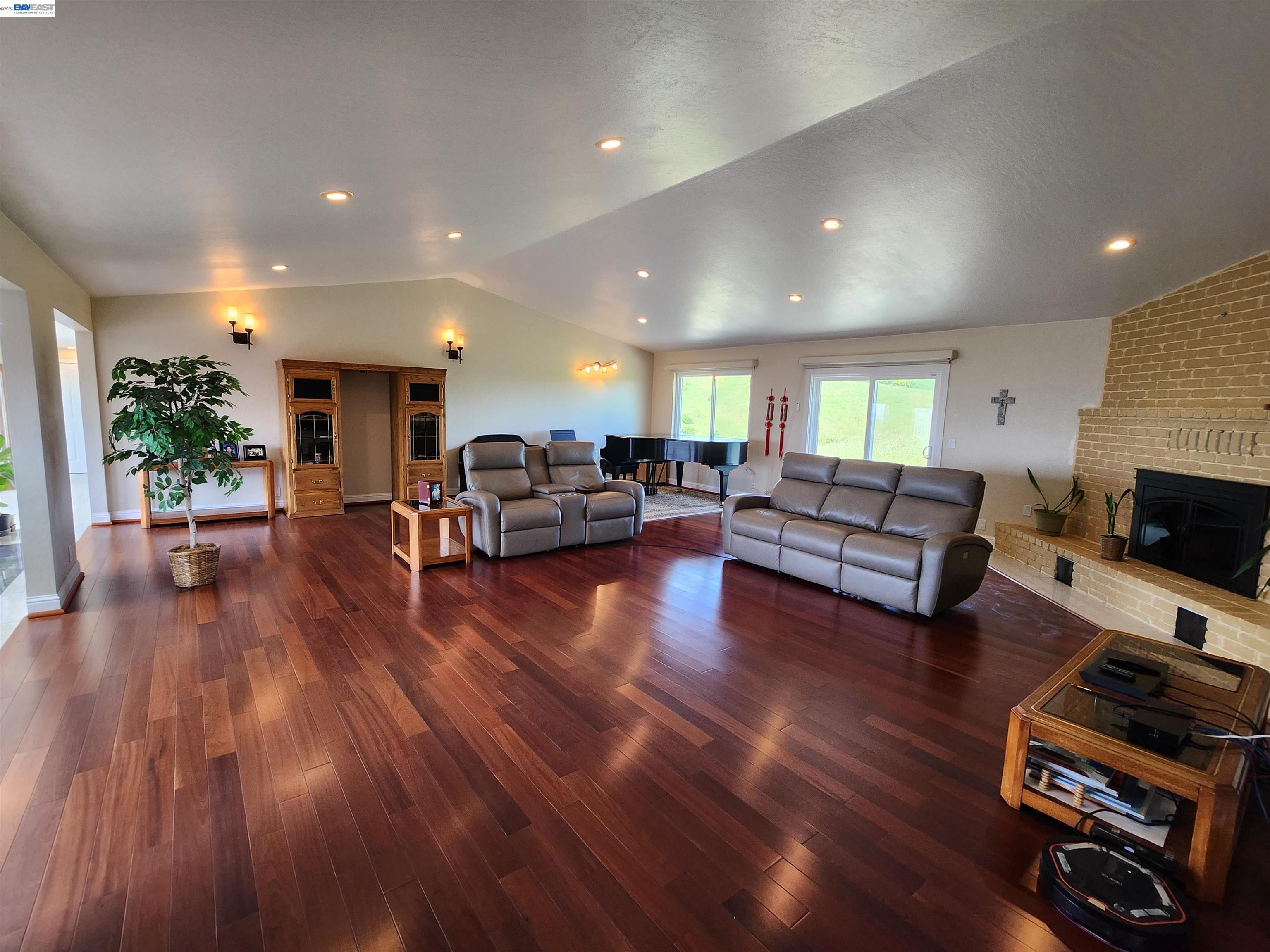 41794 Vargas Road Fremont, CA 94539 - Photo 21 of 60 a living room with furniture and a fireplace