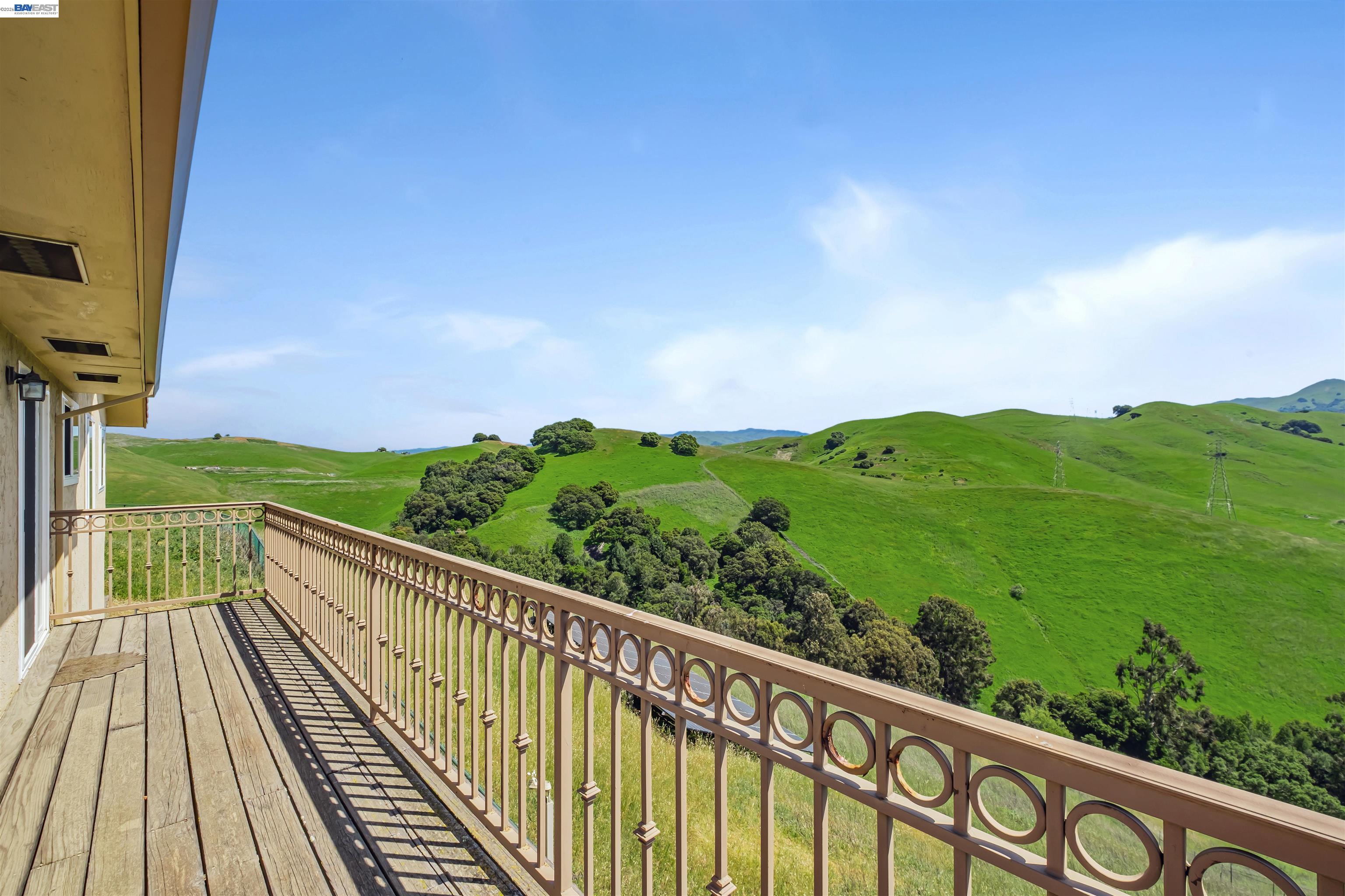 41794 Vargas Road Fremont, CA 94539 - Photo 23 of 60 a view of a balcony with wooden floor & fence