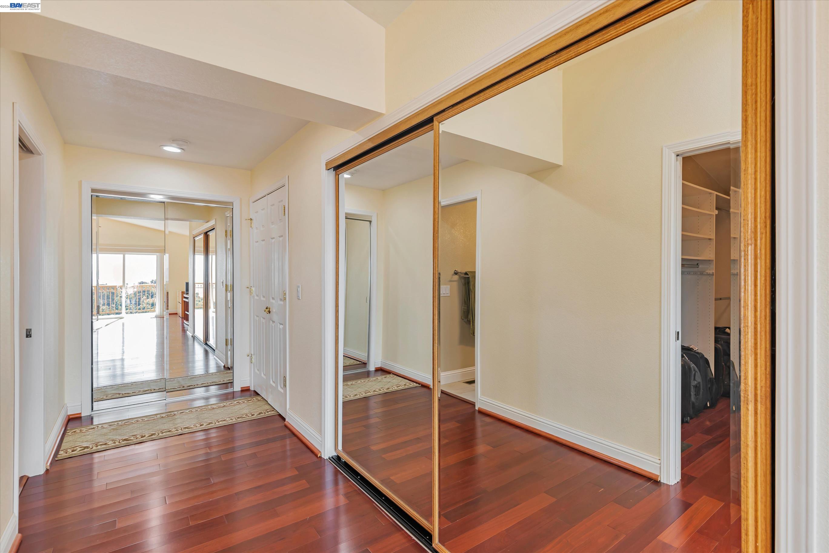 41794 Vargas Road Fremont, CA 94539 - Photo 34 of 60 a view of a hallway with wooden floor and entryway