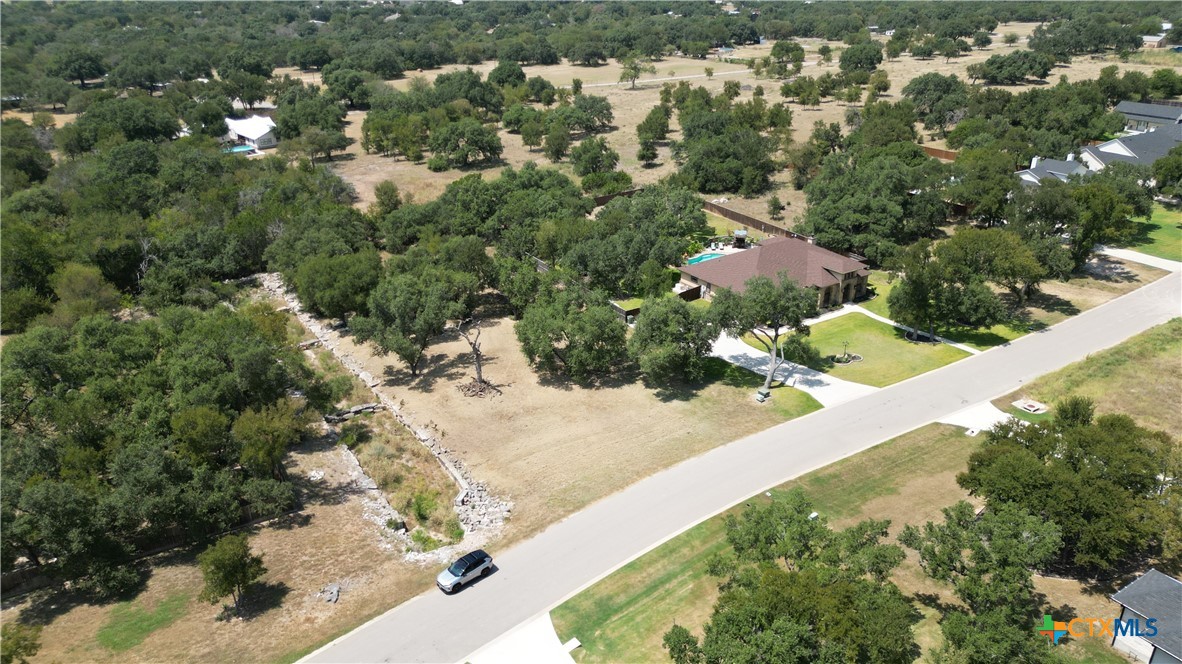 8378 Spring Creek Loop Salado, TX 76571 - Photo 11 of 12 a view of a house with a yard