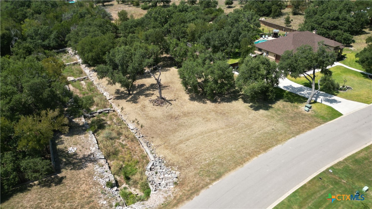 8378 Spring Creek Loop Salado, TX 76571 - Photo 2 of 12 a view of a backyard of a house