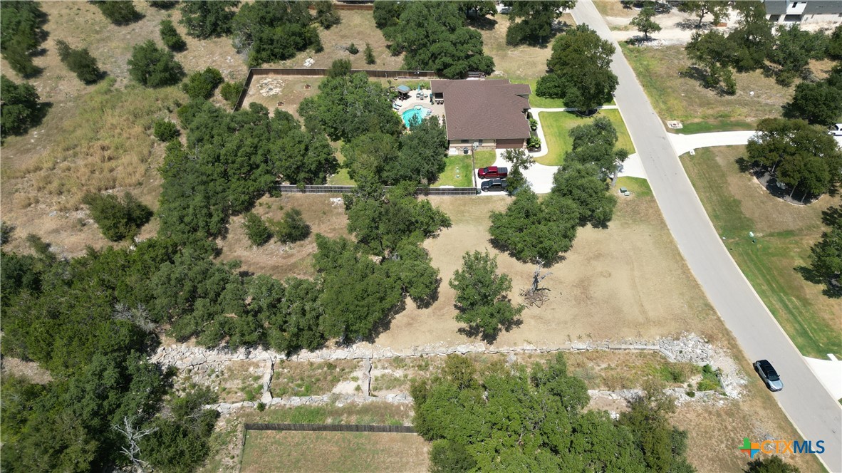 8378 Spring Creek Loop Salado, TX 76571 - Photo 5 of 12 an aerial view of residential houses with outdoor space