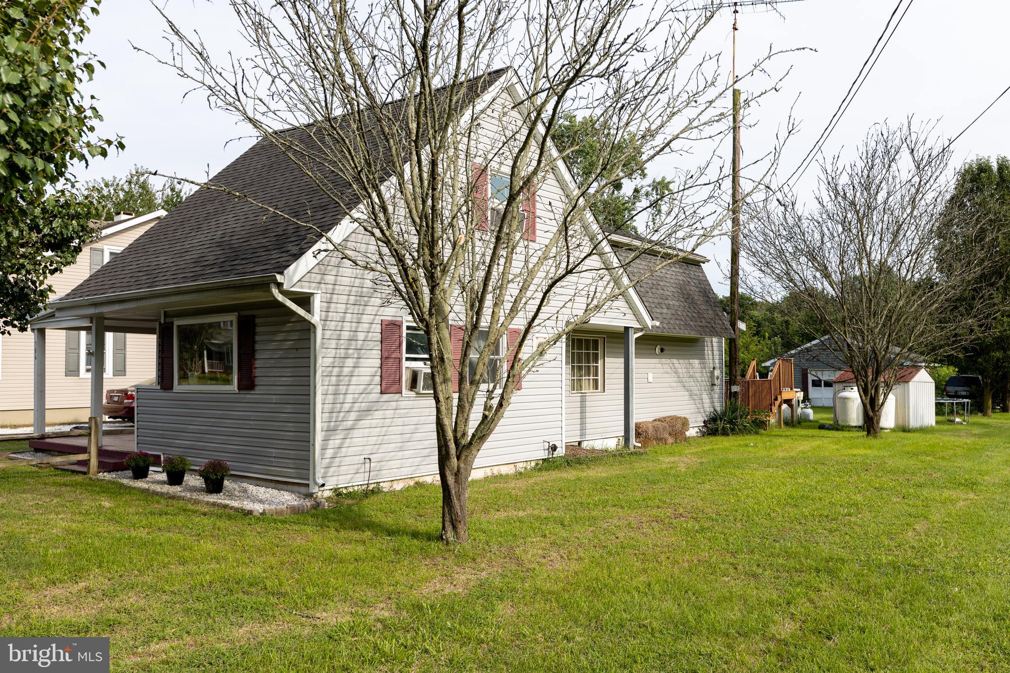 706 Camp Road Denton, MD 21629 - Photo 2 of 20 a view of a house with a yard