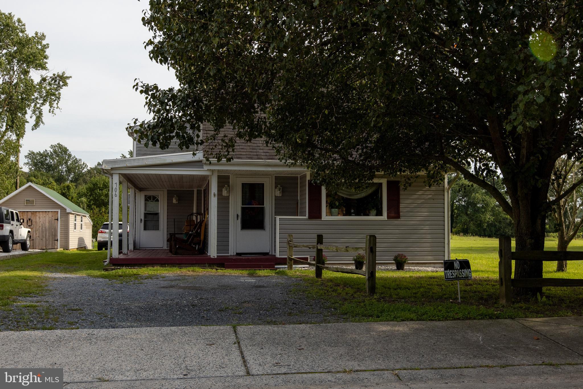 706 Camp Road Denton, MD 21629 - Photo 20 of 20 a front view of a house with garden