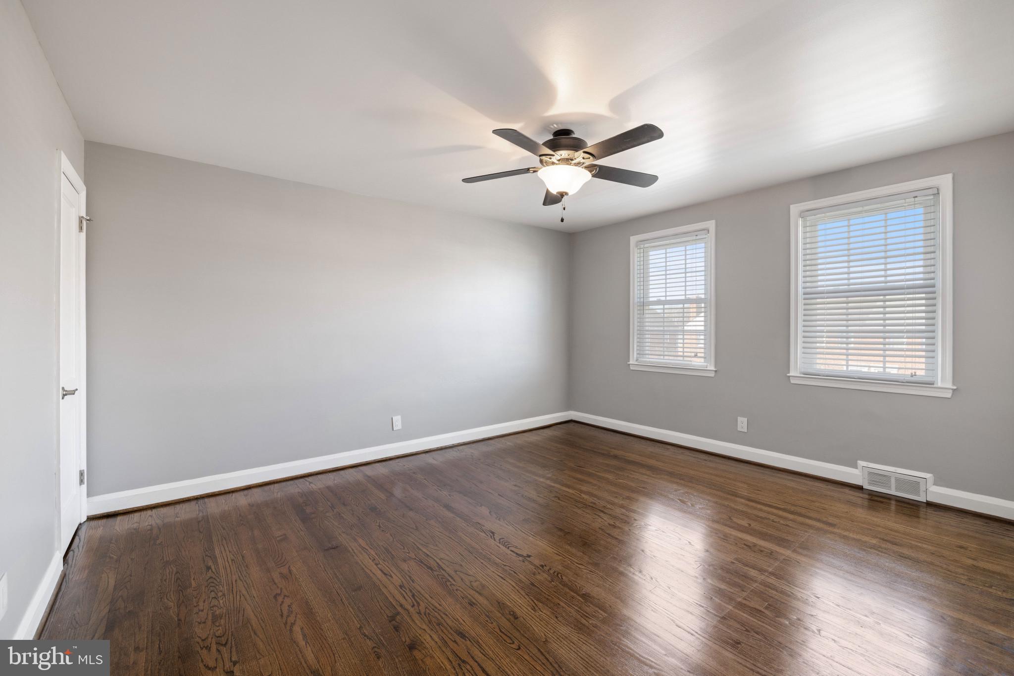 1876 Edgewood Road Towson, MD 21286 - Photo 19 of 32 a view of empty room with wooden floor and fan