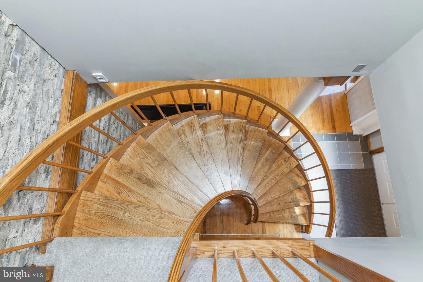 276 Stump Road North Wales, PA 19454 - Photo 63 of 71 Wood Spiral Staircase & Original Stone wall