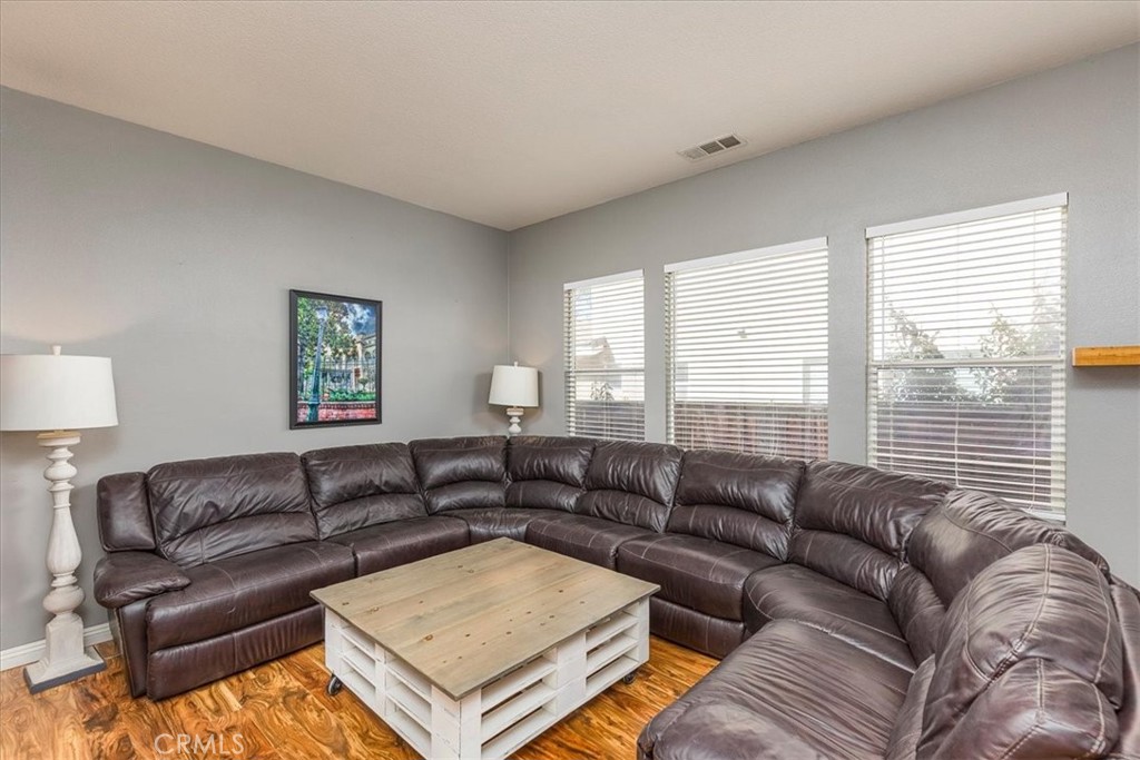 31982 Genoa Street Winchester, CA 92596 - Photo 13 of 49 Living room/Bonus Room off of front entry.