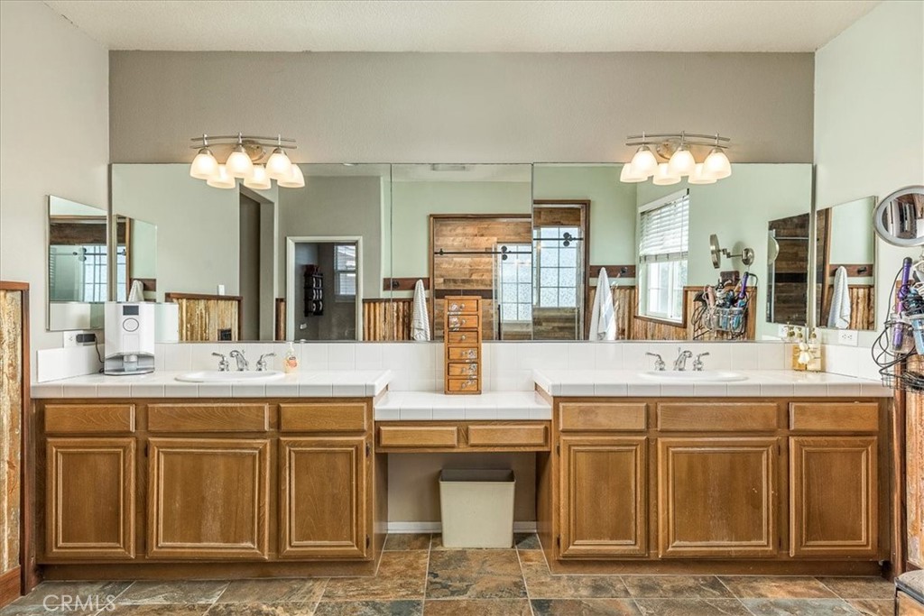 31982 Genoa Street Winchester, CA 92596 - Photo 20 of 49 Great vanity with dual basins and make up area.