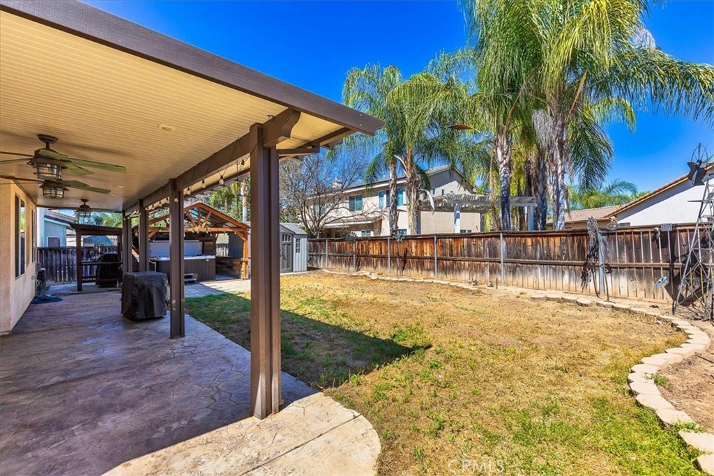 31982 Genoa Street Winchester, CA 92596 - Photo 42 of 49 Great yard for entertaining family and friends. Large alumawood covered patio.